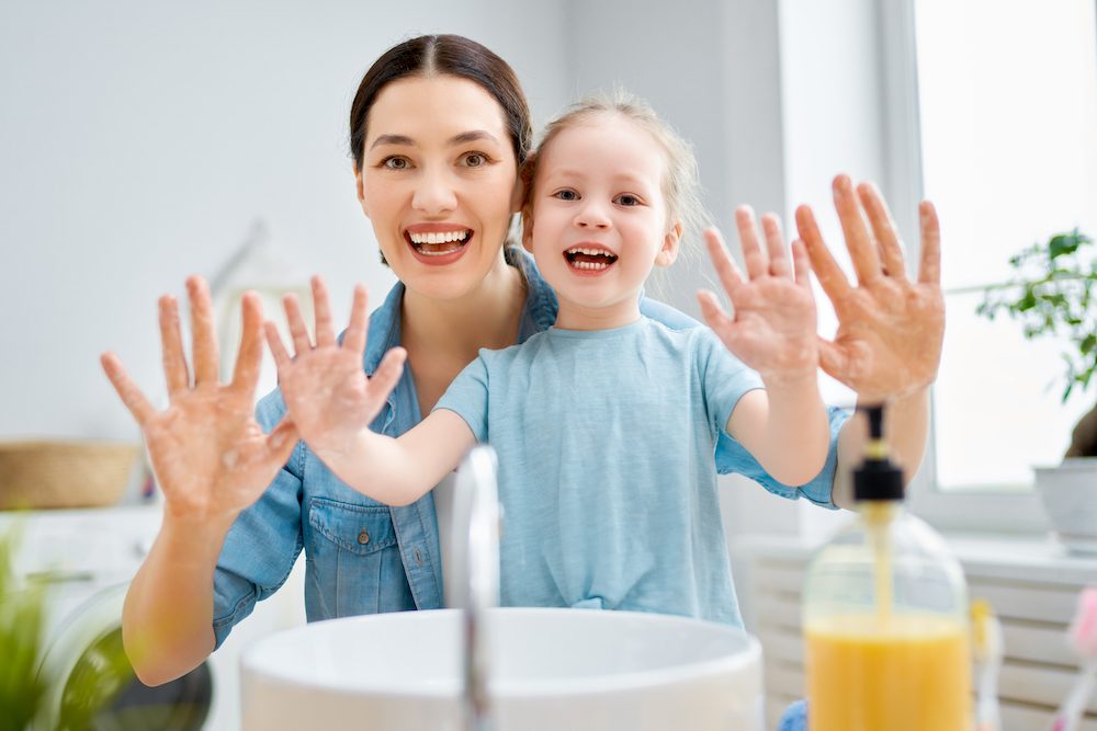 photo-a-cute-little-girl-and-her-mother-are-washing-their-hands-protection-against-infections