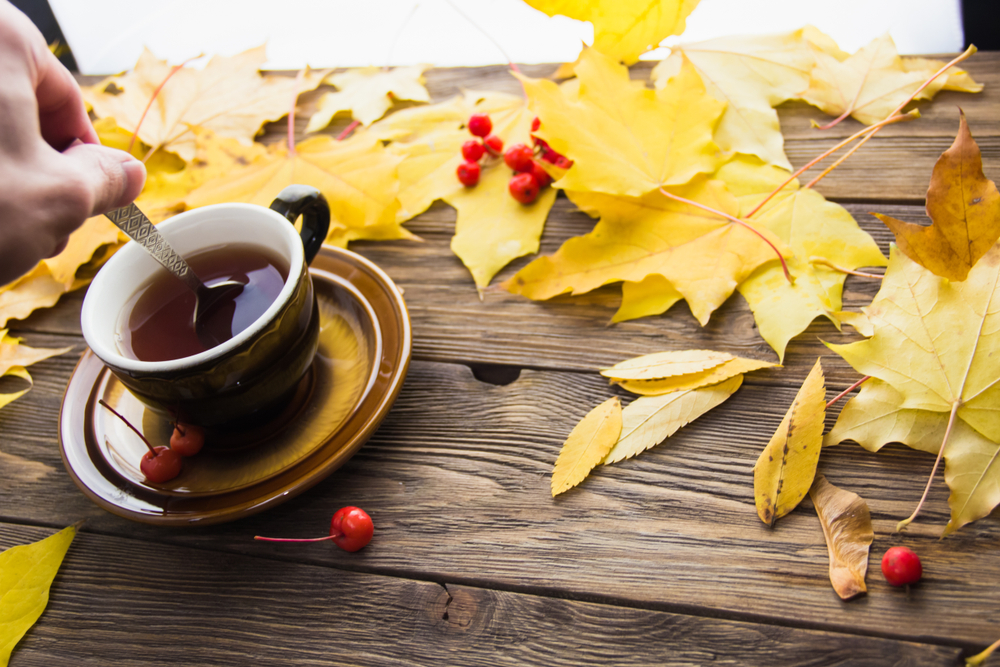 Yellow,And,Orange,Fallen,Maple,Leaves,With,Red,Tiny,Apples